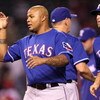 ANAHEIM, CA - JULY 08:  Andruw Jones #25 of the Texas Rangers celebrates with teammates after the game with the Los Angeles Angels of Anaheim on July 8, 2009 at Angel Stadium in Anaheim, California.  Jones hit three home runs in the game as the Rangers wo