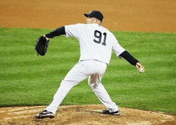 NEW YORK - JUNE 18:  Alfredo Aceves #91 of The New York Yankees pitches against The Washington Nationals during their game on June 18th, 2009 at Yankee Stadium in the Bronx Borough of New York.  (Photo by Al Bello/Getty Images)