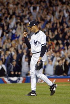 22 Oct 2001:  Marino Rivera #42 of the New York Yankees celebrates after they won game Game 5 of the American League Championship Series between the Seattle Mariners and the New York Yankees at Yankee Stadium in the Bronx, New York. Yankees won the game 1