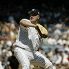 BRONX, NY - SEPTEMBER 7:  David Wells #33 of the New York Yankees pitches against the Boston Red Sox during the game at Yankee Stadium on September 7, 2003 in the Bronx, New York. The Yankees defeated the Red Sox 3-1. (Photo by Chris Trotman/Getty Images)