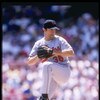 25 Jun 1997: Pitcher Mike Mussina of the Baltimore Orioles winds up to throw a pitch during the Orioles 9-1 win over the Milwaukee Brewers at Milwaukee County Stadium in Milwaukee, Wisconsin.