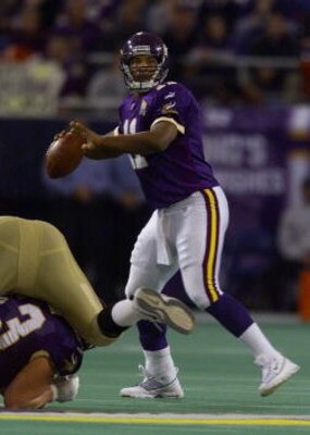 06 Jan 2001:  Quarterback Daunte Culpepper #11 of the Minnesota Vikings waits to let a pass loose against the New Orleans Saints at the Metrodome in Minneapolis, Minnesota.   The Vikings won 34-16 to advance to the NFC Championship.  < DIGITAL IMAGE> Mand