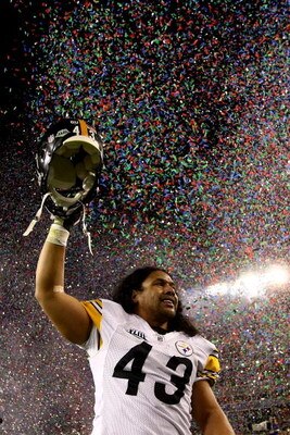 TAMPA, FL - FEBRUARY 01:  Troy Polamalu #43 of the Pittsburgh Steelers celebrates as confetti falls after they 27-23 win against the Arizona Cardinals during Super Bowl XLIII on February 1, 2009 at Raymond James Stadium in Tampa, Florida.  (Photo by Chris