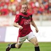 KUALA LUMPUR, MALAYSIA - JULY 18: Wayne Rooney of Manchester United runs for the ball during the pre-season friendly match between Manchester United and Malaysia XI at the Bukit Jalil National Stadium on July 18, 2009 in Kuala Lumpur, Malaysia. (Photo by 