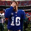 EAST RUTHERFORD, NJ - JANUARY 11:  Eli Manning #10 of the New York Giants walks off the field after losing to the Philadelphia Eagles during the NFC Divisional Playoff Game on January 11, 2009 at Giants Stadium in East Rutherford, New Jersey.The Eagles wo