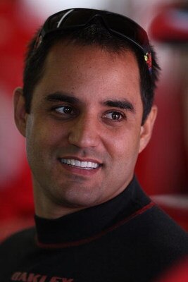 BROOKLYN, MI - JUNE 12: Juan Pablo Montoya, driver of the #42 Target Chevrolet, stands in the garage area during practice for the NASCAR Sprint Cup Series LifeLock 400 at Michigan International Speedway on June 12, 2009 in Brooklyn, Michigan.  (Photo by J