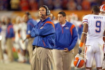 MIAMI - JANUARY 08:  Head coach Urban Meyer of the Florida Gators looks on against the Oklahoma Sooners during the FedEx BCS National Championship Game at Dolphin Stadium on January 8, 2009 in Miami, Florida.  (Photo by Eliot J. Schechter/Getty Images