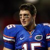 ATLANTA - DECEMBER 06:  Quarterback Tim Tebow #15 of the Florida Gators waits on stage after defeating the Alabama Crimson Tide during the SEC Championship on December 6, 2008 at the Georgia Dome in Atlanta, Georgia. The Gators defeated the Crimson Tide 3