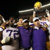 TUSCALOOSA, AL - NOVEMBER 03:  Glenn Dorsey #72, Larry Porter, head coach Les Miles and Ciron Black #70 of the LSU Tigers celebrate after defeating the Alabama Crimson Tide at Bryant-Denny Stadium on November 3, 2007 in Tuscaloosa, Alabama. LSU defeated A