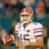 MIAMI - JANUARY 08:  Quarterback Tim Tebow #15 of the Florida Gators looks to the sidelines against the Oklahoma Sooners during the FedEx BCS National Championship Game at Dolphin Stadium on January 8, 2009 in Miami, Florida.  (Photo by Eliot J. Schechter