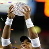 GLENDALE, AZ - JANUARY 08:  Quarterback Chris Leak #12 of the Florida Gators holds up the BCS Championship trophy after defeating the Ohio State Buckeyes 41-14 during the 2007 Tostitos BCS National Championship Game at the University of Phoenix Stadium on
