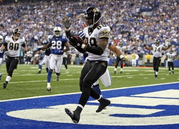 INDIANAPOLIS - DECEMBER 02:  Marcedes Lewis #89 of the Jacksonville Jaguars catches a toucdown pass during the NFL game against the Indianapolis Colts  on December 2, 2007 at the RCA Dome in Indianapolis, Indiana.  (Photo by Andy Lyons/Getty Images)  