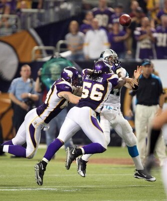 MINNEAPOLIS - SEPTEMBER 21:  Right end Jared Allen #69 and linebacker E.J. Henderson of the Minnesota Vikings rush quarterback Jake Delhomme #17 of the Carolina Panthers at the HH Humphrey Metrodome on September 21, 2008 in Minneapolis, Minnesota.  The Vi