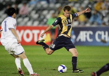 GOSFORD, AUSTRALIA - MAY 19: Alex Wilkinson of the Mariners takes a shot at goal during the AFC Champions League Group H match between the Central Coast Mariners and the Tianjin Teda at Bluetongue Stadium on May 19, 2009 in Gosford, Australia.  (Photo by 