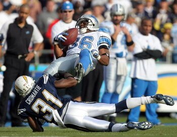 SAN DIEGO - DECEMBER 16:  Aveion Cason #36 of the Detroit Lions is tackled by Antonio Cromartie #31 of the San Diego Chargers during the first quarter at Qualcomm Stadium December 16, 2007 in San Diego California.  (Photo by Harry How/Getty Images)