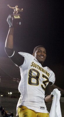LAFAYETTE, LA - DECEMBER 20:   New Orleans Bowl MVP Shawn Nelson #83 of Southern Miss holds up the MVP trophy after defeating Arkansas State 31-19 during The New Orleans Bowl on December 20, 2005 at Cajun Field in Lafayette, Louisiana.  The New Orleans Bo