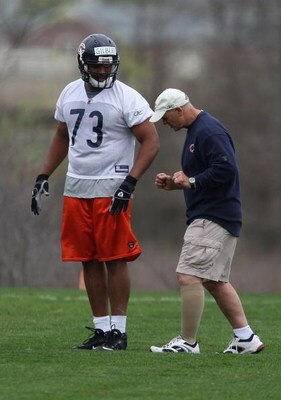 LAKE FOREST, IL - MAY 01: Defensive line coach Rob Marinelli of the Chicago Bears, former head coach of the Detroit Lions, works with Jarron Gilbert #73 during a rookie mini-camp practice on May 1, 2009 at Halas Hall in Lake Forest, Illinois. (Photo by Jo