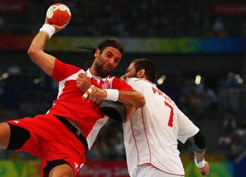 BEIJING - AUGUST 24:  Ivano Balic of Croatia competes with Carlos Prieto of Spain during the Men's Handball Bronze Medal Match between Croatia and Spain held at the National Indoor Stadium during Day 16 of the Beijing 2008 Olympic Games on August 24, 2008