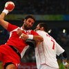 BEIJING - AUGUST 24:  Ivano Balic of Croatia competes with Carlos Prieto of Spain during the Men's Handball Bronze Medal Match between Croatia and Spain held at the National Indoor Stadium during Day 16 of the Beijing 2008 Olympic Games on August 24, 2008
