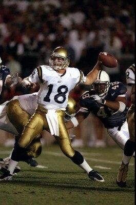10 Oct 1998:  Quarterback Cade McNown #18 of the UCLA Bruins in action during the game against the Arizona Wildcats at the Arizona Stadium in Tucson, Arizona. The Bruins defeated the Wildcats 52-28. Mandatory Credit: Tom Hauck  /Allsport