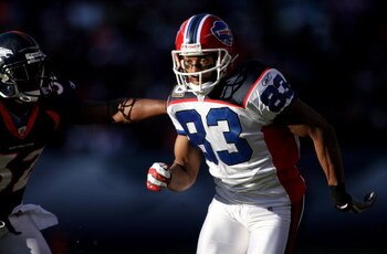 DENVER - DECEMBER 21:  Wide receiver Josh Reed #83 of the Buffalo Bills leaves the line of scrimmage as Dre Bly #32 of the Denver Broncos defends during NFL action at Invesco Field at Mile High on December 21, 2008 in Denver, Colorado. The Bills defeated 