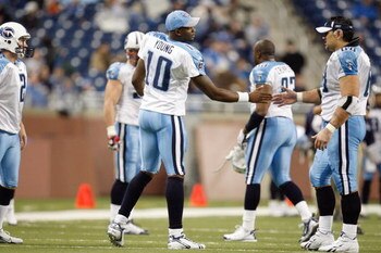 DETROIT , MI - NOVEMBER 27:  Quarterback Vince Young #10 of the Tennessee Titans greets center Kevin Mawae #68 before the game against the Detroit Lions on November 27, 2008 at Ford Field in Detroit, Michigan. (Photo by Gregory Shamus/Getty Images)