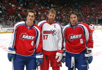 MONTREAL - JANUARY 25:  (L-R) Vincent Lecavalier #4 of the Eastern Conference All-Stars, Joe Thornton #97 of the Western Conference All-Stars and Alexander Ovechkin #8 of the Eastern Conference All-Stars pose for a photo prior to the 2009 NHL All-Star gam