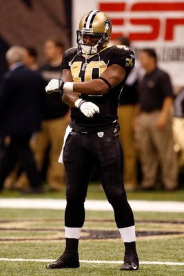NEW ORLEANS - NOVEMBER 24:  Mike Bell #40 of the New Orleans Saints warms up before playing the Green Bay Packers on November 24, 2009 at the Superdome in New Orleans, Louisiana.  (Photo by Chris Graythen/Getty Images)