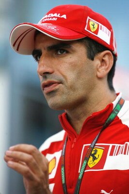 BUDAPEST, HUNGARY - JULY 25:  Ferrari reserve driver Marc Gene of Spain is interviewed in the paddock following qualifying for the Hungarian Formula One Grand Prix at the Hungaroring on July 25, 2009 in Budapest, Hungary.  (Photo by Paul Gilham/Getty Imag