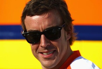 BUDAPEST, HUNGARY - JULY 24:  Fernando Alonso of Spain and Renault is interviewed in the paddock following practice for the Hungarian Formula One Grand Prix at the Hungaroring on July 24, 2009 in Budapest, Hungary.  (Photo by Ryan Pierse/Getty Images)