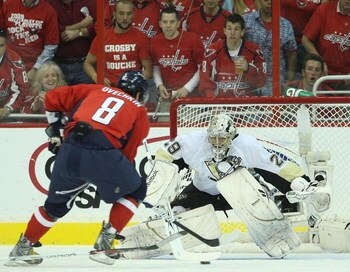 WASHINGTON - MAY 13: Alex Ovechkin #8 of the Washington Capitals is stopped by Marc-Andre Fleury #29 of the Pittsburgh Penguins during first period action in Game Seven of the Eastern Conference Semifinal  Round of the 2009 Stanley Cup Playoffs at Verizon