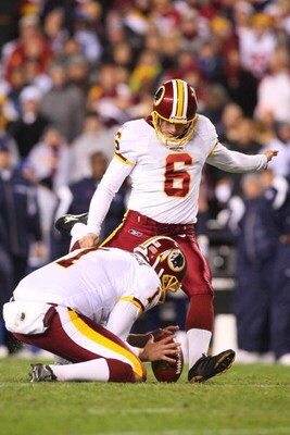 LANDOVER, MD - NOVEMBER 16:  Shaun Suisham #6 kicks a field goal set up by teammate Ryan Plackemeir #1 of the Washington Redskins during the game against the Dallas Cowboys on November 16, 2008 at FedEx Field in Landover, Maryland.  (Photo by Jim McIsaac/