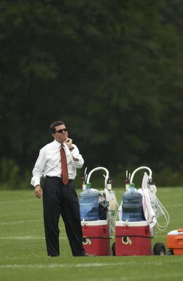 ASHBURN, VA - JULY 28:  Owner Dan Snyder of the Washington Redskins looks on from the sideline during the first day of training camp on July 28, 2003 at Redskin Park in Ashburn, Virginia. (Photo by Greg Fiume/Getty Images)