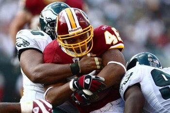 PHILADELPHIA - OCTOBER 05: Ladell Betts #46 of the Washington Redskins is tackled by Mike Patterson #98 of the Philadelphia Eagles on October 5, 2008 at Lincoln Financial Field in Philadelphia, Pennsylvania.  (Photo by Chris McGrath/Getty Images)