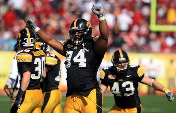 TAMPA, FL - JANUARY 01:  Adrian Clayborn #94 of the Iowa Hawkeyes celebrates after an interception against the South Carolina Gamecocks during the Outback Bowl on January 1, 2009 at Raymond James Stadium in Tampa, Florida.  (Photo by Scott Halleran/Getty 