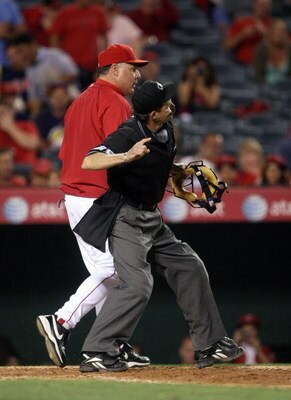 ANAHEIM, CA - MAY 6: Home plate umpire Bill Hohn ejects manager Mike Scioscia of the Los Angeles Angels of Anaheim during an argument at home in the game with the Toronto Blue Jays at Angel Stadium May 6, 2009 in Anaheim, California.  (Photo by Stephen Du