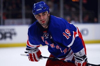 NEW YORK - FEBRUARY 28:  Scott Gomez #19 of the New York Rangers looks on against the Colorado Avalanche during the game on February 28, 2009 at Madison Square Garden in New York City.  (Photo by Chris McGrath/Getty Images)