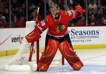 CHICAGO - MAY 22:  Goalie Cristobal Huet #38 of the Chicago Blackhawks tends goal against the Detroit Red Wings during Game Three of the Western Conference Championship Round of the 2009 Stanley Cup Playoffs on May 22, 2009 at the United Center in Chicago