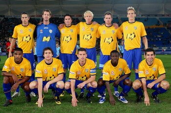 GOLD COAST, AUSTRALIA - JULY 08:  Gold Coast United pose for a photo before the exhibition football match between Gold Coast United and Fulham FC at Skilled Stadium on July 8, 2009 in Gold Coast, Australia.  (Photo by Bradley Kanaris/Getty Images)