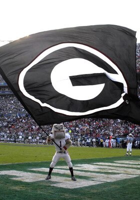 ORLANDO, FL - JANUARY 1: The mascot of the University of Georgia waoves a giant flag and celebrates a touchdown against the Michigan State Spartans at the 2009 Capital One Bowl at the Citrus Bowl on January 1, 2009 in Orlando, Florida.  (Photo by Al Messe
