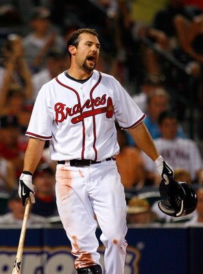 ATLANTA - JUNE 26:  Casey Kotchman #22 of the Atlanta Braves reacts after striking out against the Boston Red Sox at Turner Field on June 26, 2009 in Atlanta, Georgia.  (Photo by Kevin C. Cox/Getty Images)