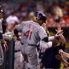 ANAHEIM, CA - JULY 27:  Victor Martinez #41 of the Cleveland Indians receives high fives from the dugout after hitting a three-run home run in the ninth inning against the Los Angeles Angels of Anaheim at Angel Stadium on July 27, 2009 in Anaheim, Califor