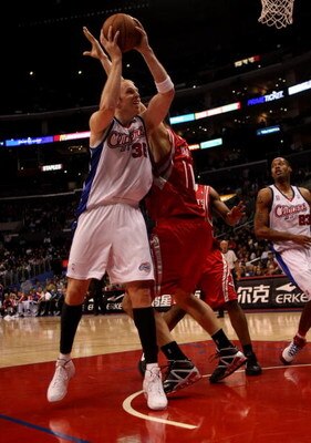 LOS ANGELES - NOVEMBER 7:  Chris Kaman #35 of the Los Angeles Clippers goes up for a shot against Yao Ming #11 of the Houston Rockets on November 7, 2008 at Staples Center in Los Angeles, California.  The Rockets won 92-83.  NOTE TO USER: User expressly a