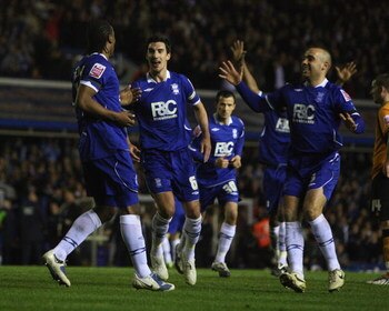 BIRMINGHAM, ENGLAND - APRIL 06:  Cameron Jerome of Birmingham City is mobbed by team mates after scoring the first goal after a mistake by Wolves' keeper Wayne Hennesseyduring the Coca-Cola Championship match between Birmingham City and Wolverhampton Wand