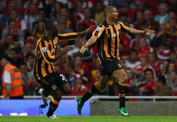 LONDON - SEPTEMBER 27:  Daniel Cousin of Hull City celebrates with teammates after scoring during the Barclays Premier League match between Arsenal and Hull City at the Emirates Stadium on September 27, 2008 in London, England.  (Photo by Mike Hewitt/Gett