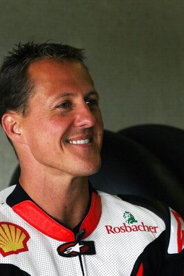 HOHENSTEIN-ERNSTTHAL, GERMANY - JUNE 12: Michael Schumacher of Germany and Holzhauer Racing Team smiles during the International German Championship IDM training session at Sachsenring racetrack on June 12, 2009 in Hohenstein-Ernstthal, Germany. Schumache