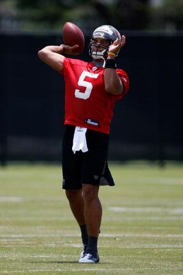 TAMPA, FL - MAY 01:  Quarterback Josh Freeman #5 of the Tampa Bay Buccaneers throws a pass during the Buccaneers Rookie Minicamp at One Buccaneer Place on May 1, 2009 in Tampa, Florida.  (Photo by J. Meric/Getty Images)