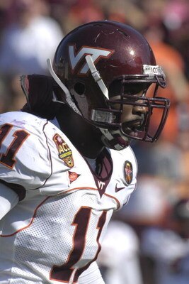 JACKSONVILLE, FL - DECEMBER 1: Linebacker Xavier Adibi #11 of the Virginia Tech Hokies lines up on defense against the Boston College Eagles in the ACC Championship Game at Jacksonville Municipal Stadium on December 1, 2007 in Jacksonville, Florida.  The 