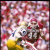 6 Sep 1986:  Linebacker Brian Bosworth (right) of the University of Oklahoma pursues a UCLA running back during the Sooners 38-3 win over UCLA at Memorial Stadium in Norman, Oklahoma. Mandatory Credit: Allsport  /Allsport