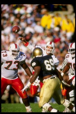 20 Oct 1990:  Quarterback Craig Erickson of the Miami Hurricanes passes the ball during a game against the Notre Dame Fighting Irish.  Notre Dame won the game 29-20. Mandatory Credit: Rick Stewart  /Allsport